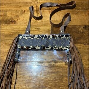 Clear stadium bag with fringe and LV and leopard trim